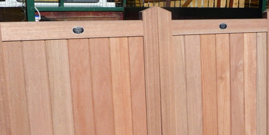 Framed solid flat top driveway gate