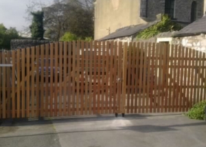 Paled arched top driveway gates