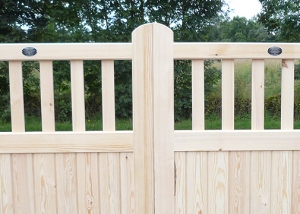 Framed part solid flat top driveway gate