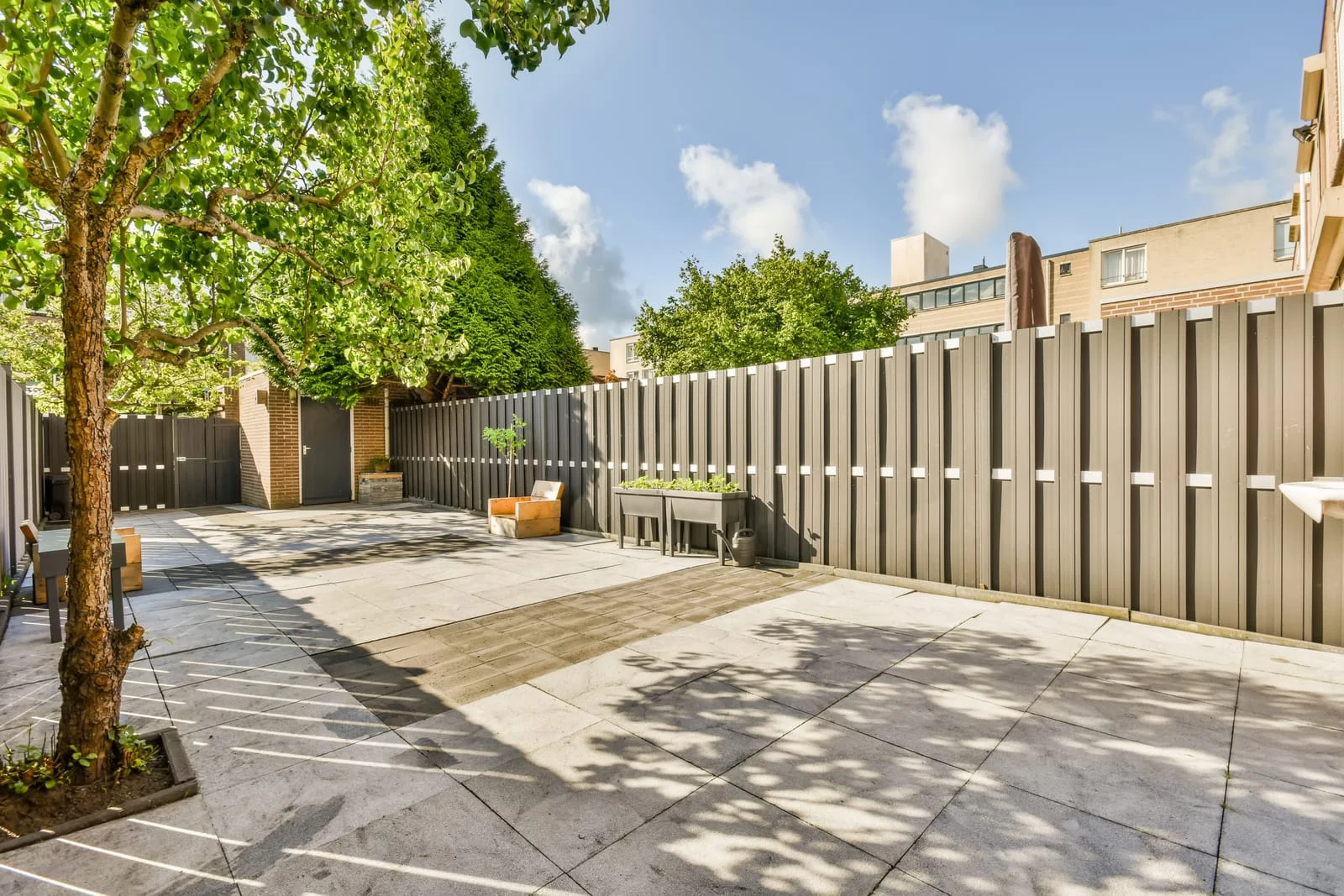 96214996_a-courtyard-with-a-fence-and-a-tree | Empress Fencing Clitheroe Lancashire Property Appeal